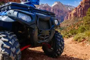 Polaris UTV on a rugged trail in Zion National Park, Utah during an off-road adventure rental